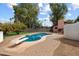 Inviting backyard oasis featuring a sparkling pool with a diving board, perfect for summer fun at 2942 E Mulberry Dr, Phoenix, AZ 85016