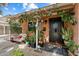 Cozy front porch decorated with plants and a charming bench for relaxing at 2942 E Mulberry Dr, Phoenix, AZ 85016