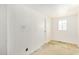 An unfinished basement with white walls, concrete floors, and a window at 3034 W San Miguel Ave, Phoenix, AZ 85017