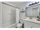 Clean, well-maintained bathroom with a shower-tub combo and modern sink at 3350 W Charter Oak Rd, Phoenix, AZ 85029