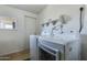 Clean laundry room with modern appliances and ample lighting at 3350 W Charter Oak Rd, Phoenix, AZ 85029