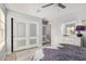 Bedroom with a light gray color scheme, featuring a large closet and a white dresser at 337 E Clairidge Dr, San Tan Valley, AZ 85143