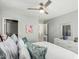 Comfortable bedroom with a ceiling fan, featuring a decorative dresser and views of the hallway at 337 E Clairidge Dr, San Tan Valley, AZ 85143