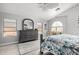 Vaulted ceiling bedroom with a large dresser and mirror, complemented by a cozy rug and beach themed bedding at 337 E Clairidge Dr, San Tan Valley, AZ 85143