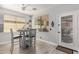 Quaint breakfast nook with a charming round table and serene natural light from the exterior door at 337 E Clairidge Dr, San Tan Valley, AZ 85143