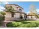 Beautiful home with lush green lawn, mature shade trees, and well-maintained landscaping at 337 E Clairidge Dr, San Tan Valley, AZ 85143