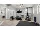 Home gym with multiple machines. The walls are painted in light gray. A ceiling fan is available too at 337 E Clairidge Dr, San Tan Valley, AZ 85143