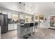 Modern kitchen featuring stainless steel appliances, gray countertops, and an adjacent breakfast nook at 337 E Clairidge Dr, San Tan Valley, AZ 85143