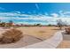 Expansive park with a walking trail and open space for recreation at 337 E Clairidge Dr, San Tan Valley, AZ 85143