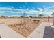 Neighborhood playground with climbing structure and benches in a well-maintained park at 337 E Clairidge Dr, San Tan Valley, AZ 85143