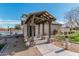 Community pool house featuring covered entrance and well-manicured landscaping at 337 E Clairidge Dr, San Tan Valley, AZ 85143