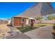 Backyard features outdoor seating area, gazebo, and a mix of concrete, synthetic grass, and desert landscaping at 354 W Bealey Ave, Coolidge, AZ 85128