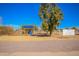 North Park featuring a playground, swing set, desert landscaping, and park rules sign at 354 W Bealey Ave, Coolidge, AZ 85128