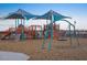 Colorful playground with slides, swings, and climbing structures, perfect for ' outdoor adventures at 37056 W Prado St, Maricopa, AZ 85138