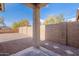 Covered back patio with desert landscaping and privacy walls at 38672 N Establo Dr, San Tan Valley, AZ 85140