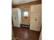 Bedroom closet with a bench, decorative window, and two large wardrobe cabinets at 3881 E Birchwood Pl, Chandler, AZ 85249