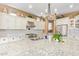 Bright kitchen featuring stainless steel appliances, and a large center island with sink at 3881 E Birchwood Pl, Chandler, AZ 85249