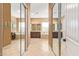 Luxurious main bathroom with double vanity, soaking tub, and ample natural light flowing in from the windows at 3881 E Birchwood Pl, Chandler, AZ 85249