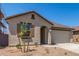 Charming single story home with a tile roof, stucco exterior, and a two car garage at 3906 N 103Rd Ave, Avondale, AZ 85392