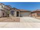 Charming single story home with a tile roof, stucco exterior, and a two car garage at 3906 N 103Rd Ave, Avondale, AZ 85392