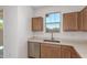 This cozy kitchen is equipped with stainless steel appliances and lots of counter space at 3906 N 103Rd Ave, Avondale, AZ 85392