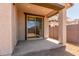 Covered patio extends living space outdoors with sliding glass door at 3906 N 103Rd Ave, Avondale, AZ 85392