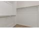 Walk-in closet with carpeted floor and basic clothes rods at 3906 N 103Rd Ave, Avondale, AZ 85392