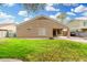 Low-maintenance backyard with a covered patio and decorative rock accents at 39242 N Luke Cir, San Tan Valley, AZ 85140