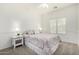 Well-lit bedroom showcasing a comfortable bed and an abundance of natural light at 39242 N Luke Cir, San Tan Valley, AZ 85140