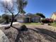 Charming single-story home with a well-kept front yard and xeriscaping at 39242 N Luke Cir, San Tan Valley, AZ 85140