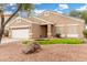 Lovely single-story home with a cozy entrance, desert landscaping, and attached two car garage at 39242 N Luke Cir, San Tan Valley, AZ 85140