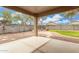 Covered patio space overlooking a private, low-maintenance backyard at 39242 N Luke Cir, San Tan Valley, AZ 85140