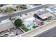 Aerial view of a home featuring a private pool and well-maintained landscaping at 3938 E Gable Ave, Mesa, AZ 85206