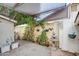 Shaded patio with a water fountain, creating a tranquil space to relax and enjoy the outdoors at 3938 E Gable Ave, Mesa, AZ 85206