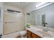 Bathroom featuring a shower-tub, toilet, and vanity with a wide mirror at 3938 E Gable Ave, Mesa, AZ 85206