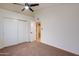 Bedroom with neutral carpet, vaulted ceiling, and view to the doorway at 3938 E Gable Ave, Mesa, AZ 85206