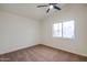 Bedroom with neutral carpet and a large window providing ample natural light at 3938 E Gable Ave, Mesa, AZ 85206