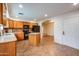 Spacious kitchen with wooden cabinets, a functional island, and modern appliances for culinary enthusiasts at 3938 E Gable Ave, Mesa, AZ 85206