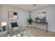 Cozy living room featuring neutral paint, tile floors, and modern furniture at 3938 E Gable Ave, Mesa, AZ 85206