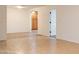 Empty living room exhibiting tile flooring, neutral walls, and generous space for flexible interior design at 3938 E Gable Ave, Mesa, AZ 85206