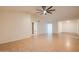 Bright living room featuring neutral paint, vaulted ceiling, and tile floors at 3938 E Gable Ave, Mesa, AZ 85206