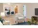 Living room view showing ample natural light, an open floor plan, and easy access to the dining area at 3938 E Gable Ave, Mesa, AZ 85206