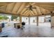 Outdoor covered patio including a built-in BBQ and ceiling fan at 3938 E Gable Ave, Mesa, AZ 85206