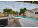 Backyard pool featuring a barbecue station with tile countertop perfect for outdoor entertaining at 3938 E Gable Ave, Mesa, AZ 85206