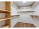 Spacious walk-in closet features custom shelving and ample storage for clothing and accessories at 3938 E Gable Ave, Mesa, AZ 85206