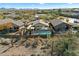 Aerial view of backyard oasis featuring pool, desert landscaping, and mountain views at 40504 N Territory Trl, Anthem, AZ 85086