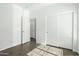 Bedroom with light walls and dark tile at 40504 N Territory Trl, Anthem, AZ 85086