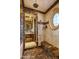 Elegant bathroom with marble accents, and a glass-enclosed shower at 42237 N 107Th Pl, Scottsdale, AZ 85262