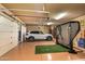 Spacious garage with epoxy floors and room for golf simulator at 42237 N 107Th Pl, Scottsdale, AZ 85262