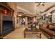 Inviting living room with custom millwork, fireplace, and comfortable seating area at 42237 N 107Th Pl, Scottsdale, AZ 85262